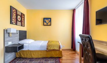 Bild på Room (Double ou Triple)-1 Queen Bed and 1 Twin Bed Free WiFi Free self parking Free breakfast