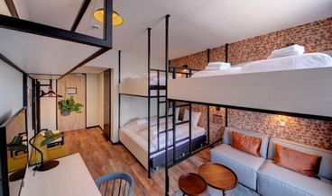 Bild på Family Room (Greenhouse Room 5)-3 Twin Beds and 1 Twin Bunk Bed Free self parking Free WiFi