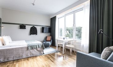Bild på Studio (Medium)-1 Queen Bed Non Refundable Free WiFi Full kitchen