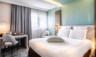 Bild på Classic Triple Room, Multiple Beds-1 Double Bed and 1 Twin Bed Non Refundable Free self parking Free WiFi