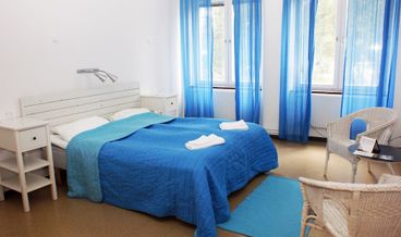 Bild på Basic Triple Room, Shared Bathroom-3 Twin Beds Non Refundable Free WiFi Free breakfast Breakfast buffet Free self parking