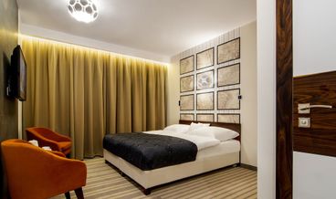 Bild på Deluxe Quadruple Room-2 Twin Beds and 1 Double Sofa Bed Free WiFi Free self parking