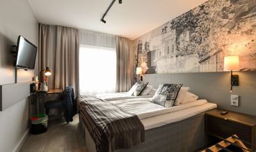 Bild på Family Room-2 Twin Beds and 1 Double Sofa Bed Non Refundable Free WiFi Free self parking Free breakfast