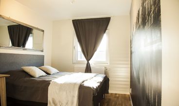 Bild på Triple Room, No Windows-1 Queen Bed and 1 Twin Bed Free WiFi Free self parking Free breakfast
