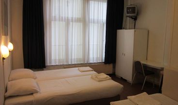 Bild på Basic Room, 2 Twin Beds, Private Bathroom-2 Twin Beds Free WiFi