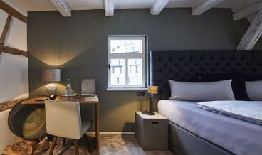 Bild på Comfort dubbelrum - privat badrum - utsikt mot staden