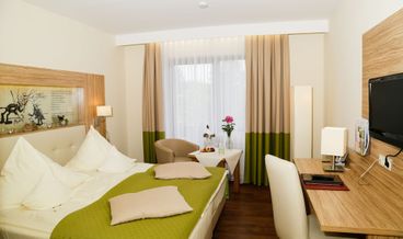 Bild på Comfort Double Room, Balcony, Garden View (Stammhaus)-1 King Bed Non Refundable Free WiFi Free self parking