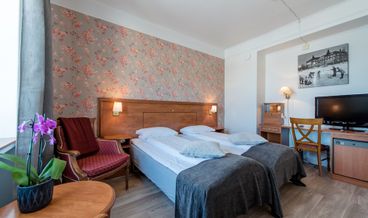 Bild på Family Room, Multiple Beds, Garden View-2 Twin Beds and 1 Double Sofa Bed Free WiFi Free self parking