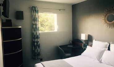 Bild på Double Room, 1 Double Bed with Sofa bed-1 Double Bed and 1 Double Sofa Bed Free self parking Free WiFi