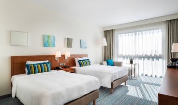 Bild på Deluxe Room, 2 Twin Beds, Non Smoking-2 Twin Beds Non Refundable Free WiFi