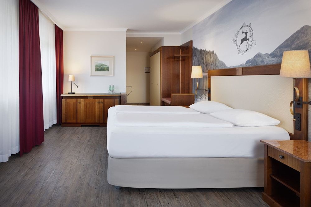Bild på Deluxe-rum - 1 kingsize-säng - utsikt mot trädgården