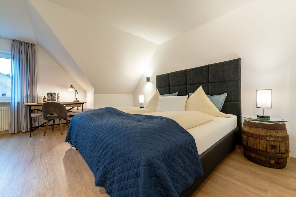 Bild på Deluxe dubbelrum - 1 queensize-säng med bäddsoffa - utsikt mot staden
