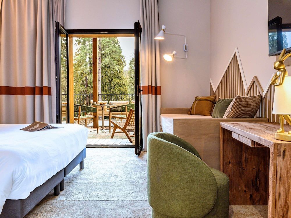 Bild på Deluxe-rum - flera sängar - terrass - utsikt mot bergen