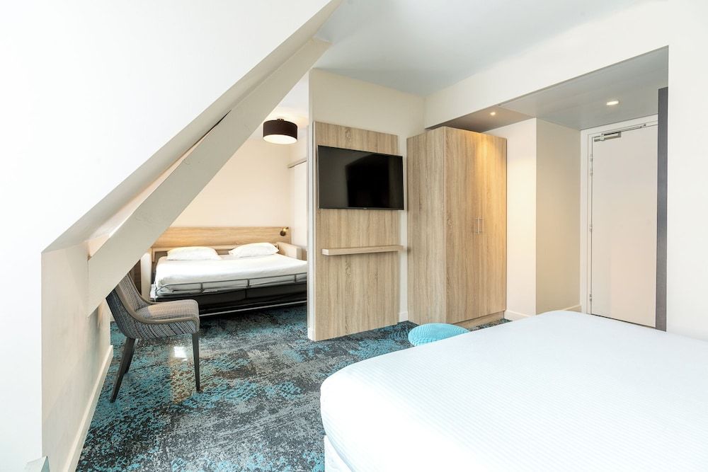 Bild på Fyrbäddsrum - 1 queensize-säng med bäddsoffa