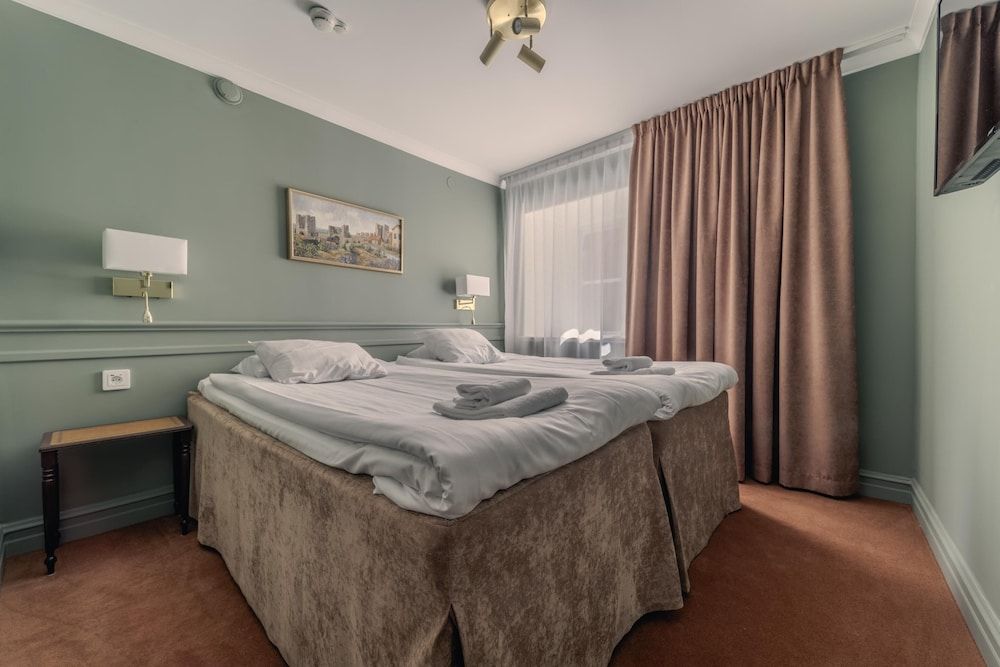 Bild på Svit - flera sängar - icke-rökare - havsutsikt (Living Room)