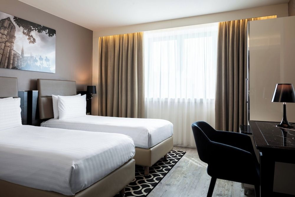 Bild på Superior-rum - 2 enkelsängar - utsikt mot staden